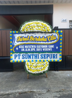 Papan Bunga Duka di Biuk
