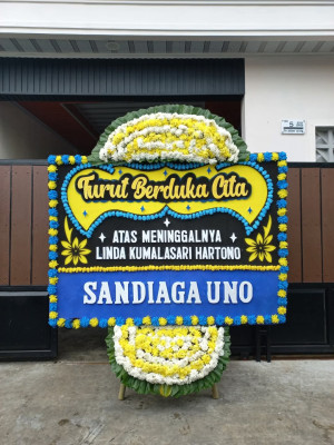 Papan Bunga Duka di Biuk