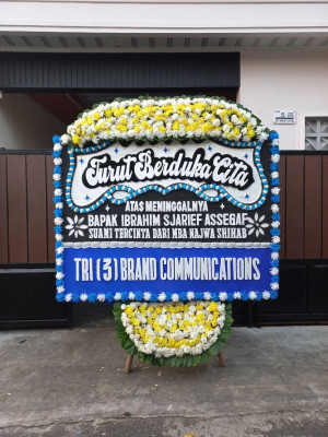 Papan Bunga Duka di Biuk